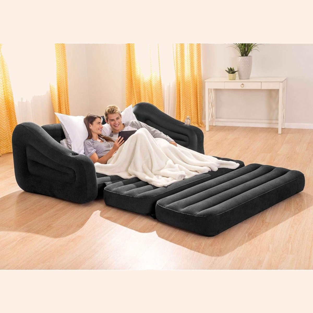 Inflatable sofa bed with electric pump